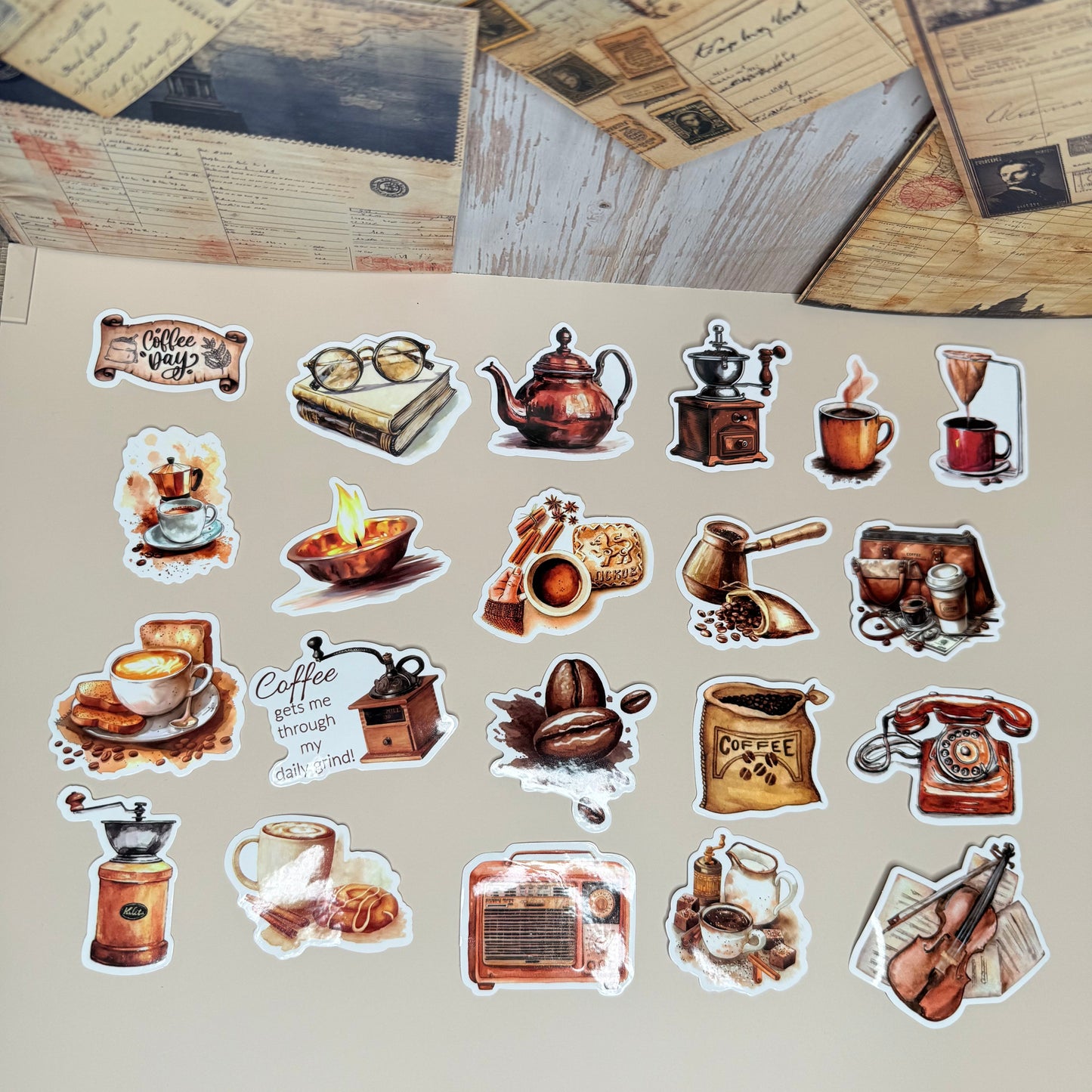 Collection of vintage-style stickers on a textured surface with a map background