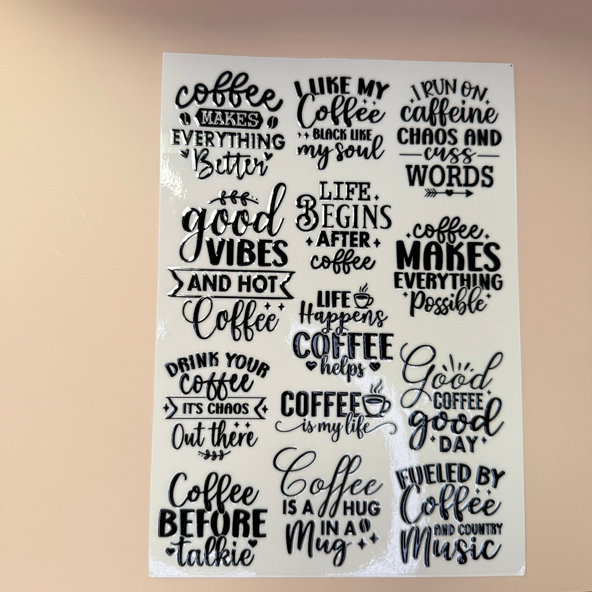 Sheet of coffee-themed sayings on a light background